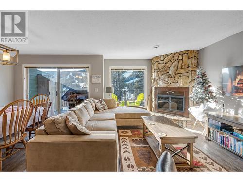 225 Clearview Road Unit# 911, Apex Mountain, BC - Indoor Photo Showing Living Room With Fireplace