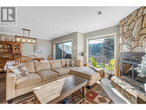 225 Clearview Road Unit# 911, Apex Mountain, BC - Indoor Photo Showing Living Room With Fireplace