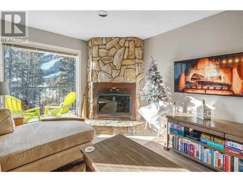 225 Clearview Road Unit# 911, Apex Mountain, BC - Indoor Photo Showing Living Room With Fireplace