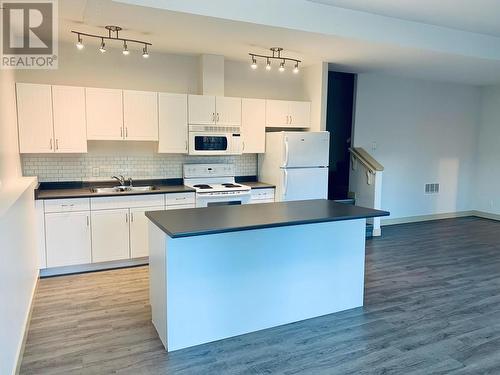 Downstairs Photos - these are from ""for rent"" ads used by landlords, prior to present tenant(s) - 4009 Okanagan Avenue, Vernon, BC - Indoor Photo Showing Kitchen With Double Sink