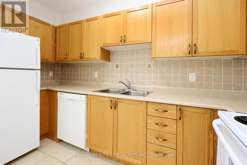 101 - 98 William Street, Mississauga, ON - Indoor Photo Showing Kitchen With Double Sink