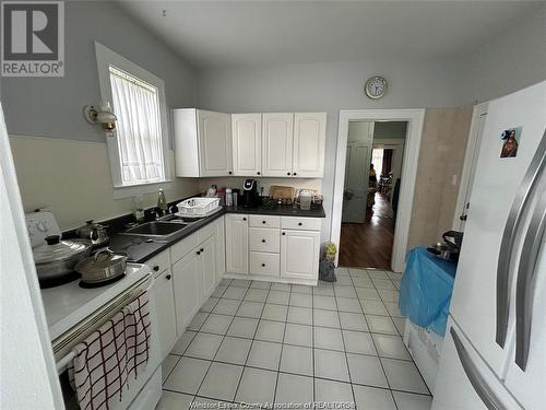 1089 Pelissier, Windsor, ON - Indoor Photo Showing Kitchen With Double Sink