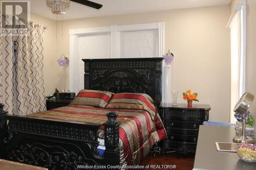 595 Cataraqui, Windsor, ON - Indoor Photo Showing Bedroom With Fireplace