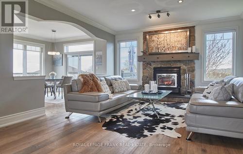 5387 Sutter Creek Drive, Hamilton Township, ON - Indoor Photo Showing Living Room With Fireplace