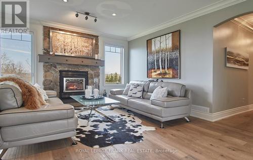 5387 Sutter Creek Drive, Hamilton Township, ON - Indoor Photo Showing Living Room With Fireplace