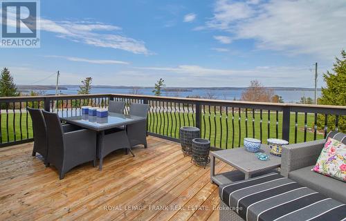 5387 Sutter Creek Drive, Hamilton Township, ON - Outdoor With Body Of Water With Deck Patio Veranda With View With Exterior