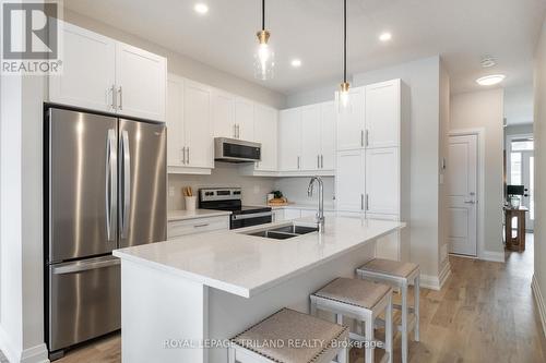 1865 Dalmagarry Road, London, ON - Indoor Photo Showing Kitchen With Double Sink With Upgraded Kitchen