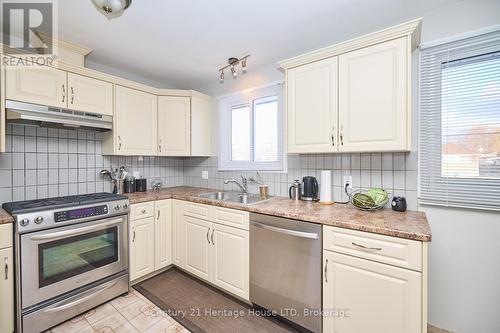 14 Janet Street, Port Colborne (875 - Killaly East), ON - Indoor Photo Showing Kitchen With Double Sink