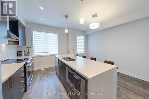 588 Rapids Lane, Mississauga, ON - Indoor Photo Showing Kitchen With Double Sink With Upgraded Kitchen