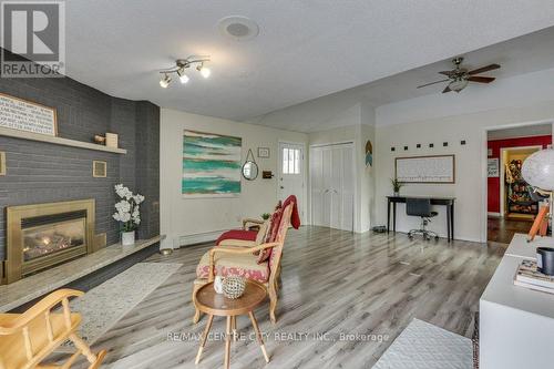 22 Ann Street, Lambton Shores (Arkona), ON - Indoor Photo Showing Living Room With Fireplace