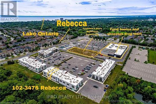 Drone / aerial view with a water view - 3475 Rebecca Street Unit# 102, Oakville, ON 