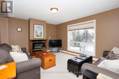 24 Kirkconnell Road, Kawartha Lakes (Lindsay), ON - Indoor Photo Showing Living Room With Fireplace