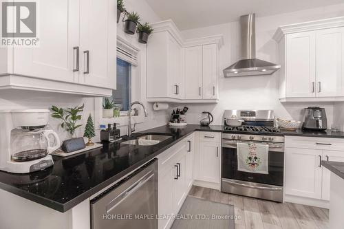 103 Middleton Avenue, London, ON - Indoor Photo Showing Kitchen With Double Sink With Upgraded Kitchen