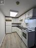 4 - 164 Clark Street, Blue Mountains, ON  - Indoor Photo Showing Kitchen With Double Sink 