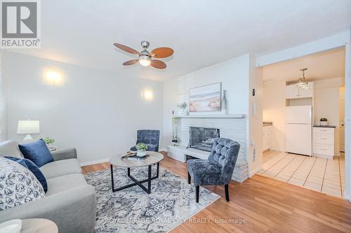 106/108 Kathleen Street, Guelph (Exhibition Park), ON - Indoor Photo Showing Living Room With Fireplace