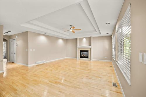 46-2365 Stillingfleet Road, Kelowna, BC - Indoor Photo Showing Other Room With Fireplace