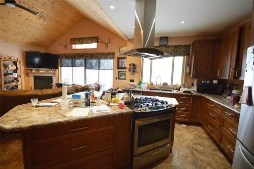 3010 Loon Lake Road, Summerland, BC - Indoor Photo Showing Kitchen With Fireplace