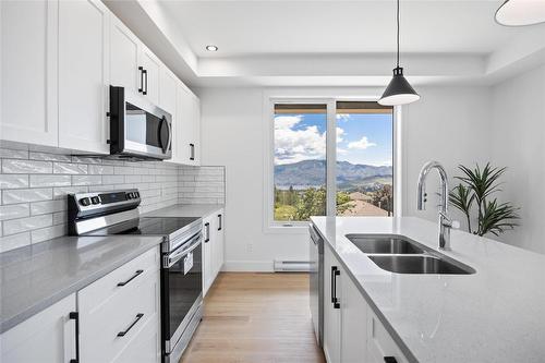 2803 Copper Ridge Drive, West Kelowna, BC - Indoor Photo Showing Kitchen With Double Sink With Upgraded Kitchen