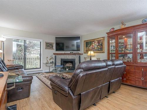 303-363 Morison Ave, Parksville, BC - Indoor Photo Showing Living Room With Fireplace