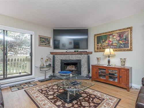 303-363 Morison Ave, Parksville, BC - Indoor Photo Showing Living Room With Fireplace