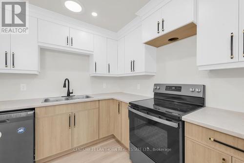 74 Duncan Street, Centre Hastings, ON - Indoor Photo Showing Kitchen With Double Sink