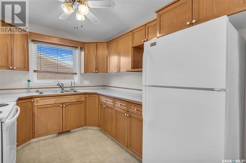 3618 Cormorant Drive E, Regina, SK - Indoor Photo Showing Kitchen With Double Sink