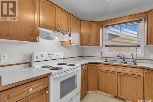 3618 Cormorant Drive E, Regina, SK - Indoor Photo Showing Kitchen With Double Sink