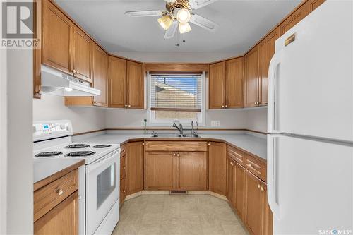 3618 Cormorant Drive E, Regina, SK - Indoor Photo Showing Kitchen With Double Sink