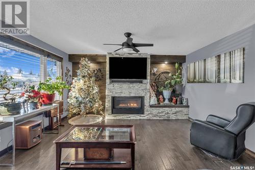 201 Hudson Avenue, Fort Qu'Appelle, SK - Indoor Photo Showing Living Room With Fireplace