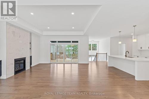 55 Tennant Drive, Rideau Lakes, ON - Indoor Photo Showing Living Room With Fireplace