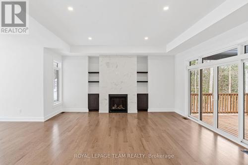 55 Tennant Drive, Rideau Lakes, ON - Indoor Photo Showing Other Room With Fireplace