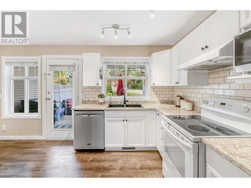 102 3825 Glen Canyon Drive, West Kelowna, BC - Indoor Photo Showing Kitchen With Double Sink