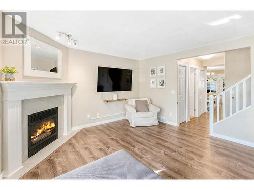 102 3825 Glen Canyon Drive, West Kelowna, BC - Indoor Photo Showing Living Room With Fireplace