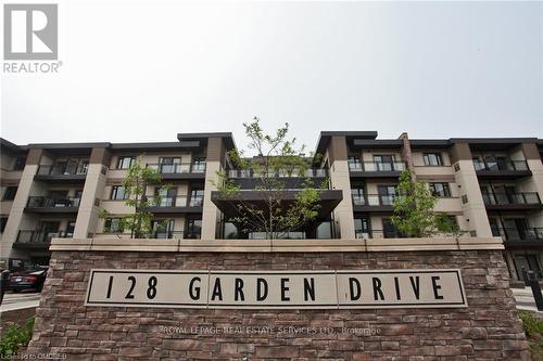 109 - 128 Garden Drive, Oakville, ON - Outdoor With Balcony With Facade