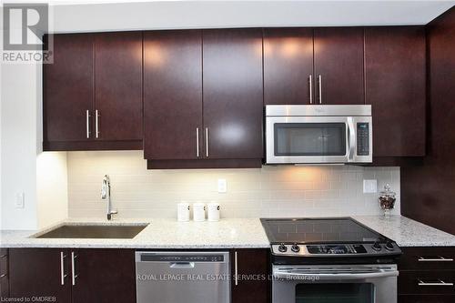 109 - 128 Garden Drive, Oakville, ON - Indoor Photo Showing Kitchen With Upgraded Kitchen