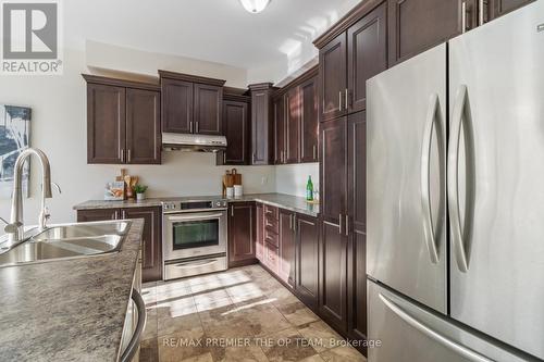 238 Medici Lane, Hamilton, ON - Indoor Photo Showing Kitchen With Double Sink With Upgraded Kitchen