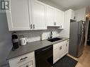 769 Klo Road Unit# 216, Kelowna, BC  - Indoor Photo Showing Kitchen With Double Sink 