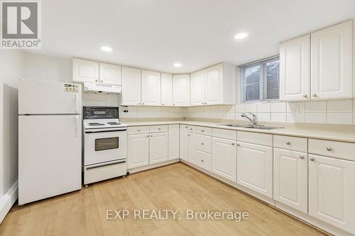 Bsmt - 635 Annette Street, Toronto, ON - Indoor Photo Showing Kitchen With Double Sink