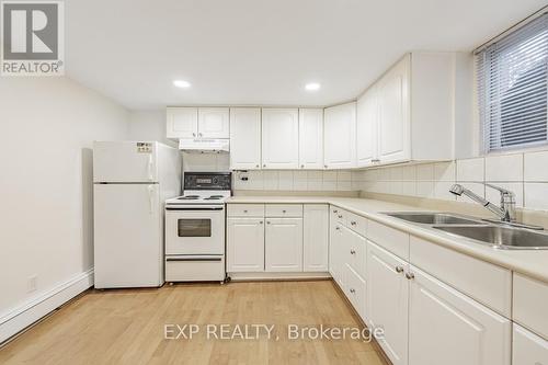 Bsmt - 635 Annette Street, Toronto, ON - Indoor Photo Showing Kitchen With Double Sink