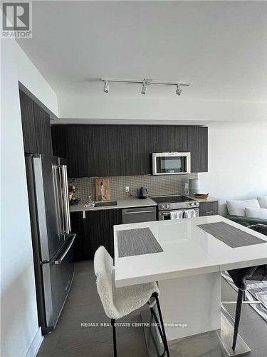 3818 - 30 Shore Breeze Drive, Toronto, ON - Indoor Photo Showing Kitchen