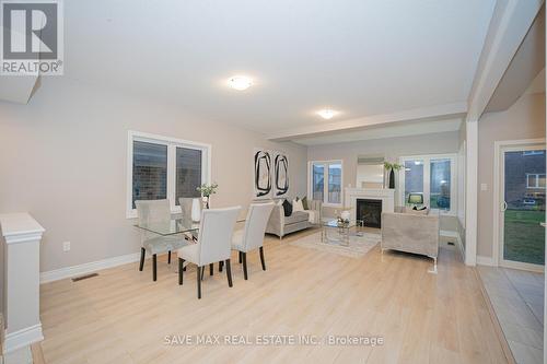 126 Sunset Way, Thorold, ON - Indoor Photo Showing Dining Room With Fireplace