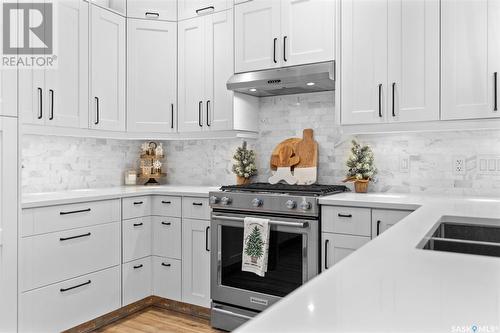 303 Waters Crescent, Saskatoon, SK - Indoor Photo Showing Kitchen With Double Sink With Upgraded Kitchen