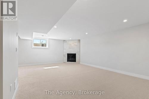 34 Marie Street, Pelham (662 - Fonthill), ON - Indoor Photo Showing Other Room With Fireplace