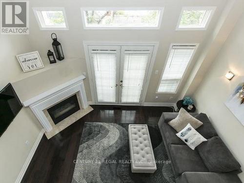 2 - 6060 Snowy Owl Crescent, Mississauga, ON - Indoor With Fireplace