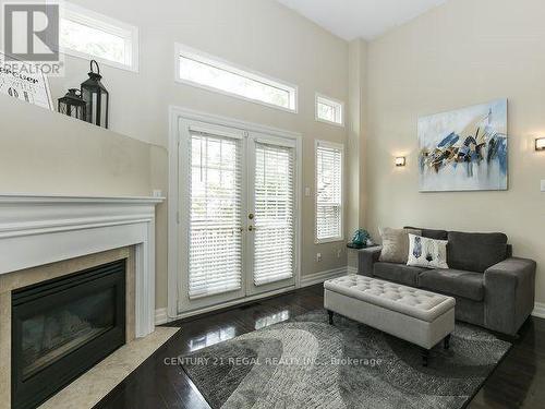 2 - 6060 Snowy Owl Crescent, Mississauga, ON - Indoor Photo Showing Living Room With Fireplace