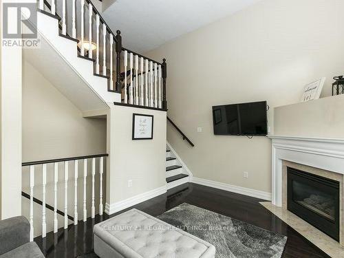 2 - 6060 Snowy Owl Crescent, Mississauga, ON - Indoor With Fireplace