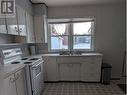 4903 48 Avenue, Pouce Coupe, BC  - Indoor Photo Showing Kitchen With Double Sink 