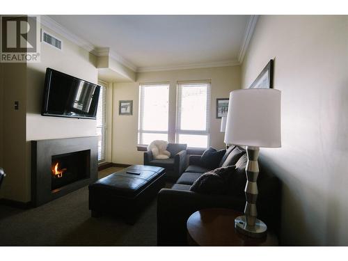 2950 Camozzi Road Unit# 2533, Revelstoke, BC - Indoor Photo Showing Living Room With Fireplace