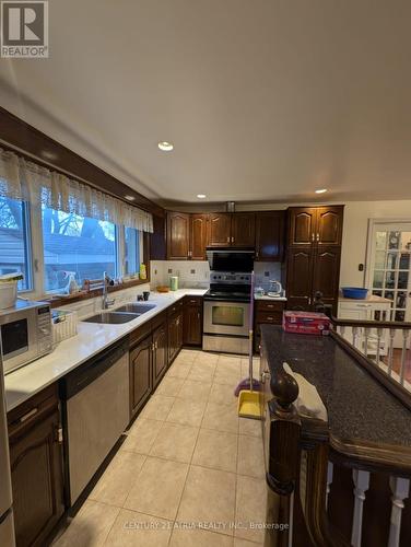 M - 15 Canham Crescent, Toronto, ON - Indoor Photo Showing Kitchen With Double Sink