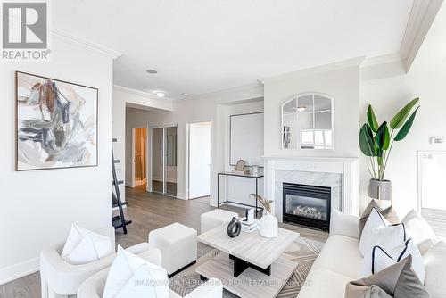 1105 - 2067 Lakeshore Boulevard W, Toronto, ON - Indoor Photo Showing Living Room With Fireplace